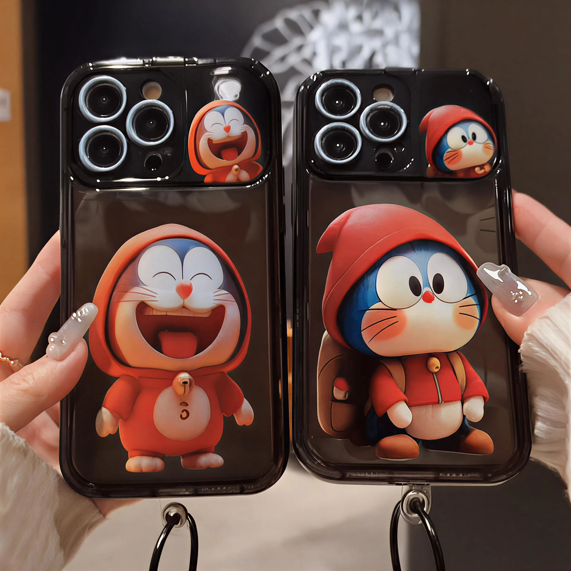 قاب آیفون Doraemon Hoodie مشکی با طرح دورامون به همراه آویز قاب آیفون Doraemon Hoodie مشکی با طرح دورامون به همراه آویز